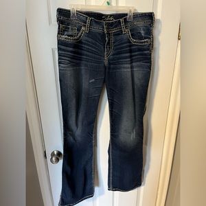 Suki Surplus Silver Jeans (bootcut) with heavy detail stitching.